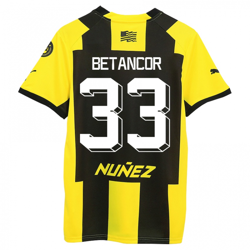 Hombre Camiseta Bruno Betancor #33 Amarillo Negro 1ª Equipación 2023/24 La Camisa Chile